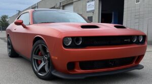 a red sportscar that had a vinyl car wrap done by Karzilla in Edmonton