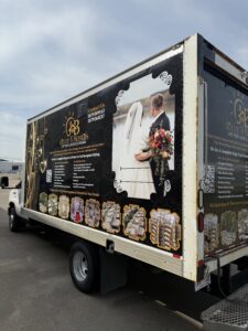 Commercial vehicle with fleet vehicle wrap graphics on the side done by Karzilla in Edmonton