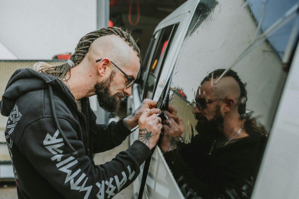 Car window tint being installed